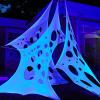 imageJOYIN 1000sqft Halloween Spider Web Decoration Outdoor GlowinTheDark Giant Spiderweb DIY Stretchy Flexible Beef Netting in White Blue at Night Green Orange for Neon Decor Indoor Haunted HouseWhite Blue Under Black Light