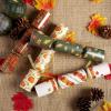imageJOYIN 12 Pack Thanksgiving Party Table Favor No Snap No Popping with Party Hat Joke ampamp Gift Inside Thanksgiving Holiday Traditions Random gifts with Autumn Leaves Pumpkin Lettering Designs