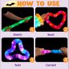 imageJOYIN 12PCS Halloween Glow Sticks Bulk Party Pack Halloween Light Up Pop Tube Toys 6 Colors Glowsticks for Kids Trick or Treat Holiday Glow in the Dark Party Supplies Favors Camp Games Activities