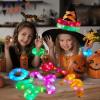 imageJOYIN 12PCS Halloween Glow Sticks Bulk Party Pack Halloween Light Up Pop Tube Toys 6 Colors Glowsticks for Kids Trick or Treat Holiday Glow in the Dark Party Supplies Favors Camp Games Activities