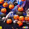 imageJOYIN 144 PCS Halloween Toy Gifts for Kid Trick or Treating 24 Pack Prefilled Mini Pumpkin Buckets with Spider Ring Popper Spring Vampire Teeth and Spinning Top Halloween Party Favors Supplies