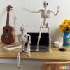 imageJOYIN 24 Inch Halloween Posable Skeleton with LED Red Glowing Eyes 2FT Realistic Hanging Skeleton Bone Full Body Movable Joints for Halloween Indoor Outdoor Decoration Prop Haunted House Party Decor
