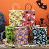 imageJOYIN 24 Pcs Halloween Paper Goodie Bags with Handles in 6 designs for Halloween Trick or Treat Colorful Candy Bags for Party Favor Party Supplies