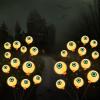 imageJOYIN Halloween Decorations Outdoor Solar Scary Eyeball Lights 4 Pcs 24LEDs Green Pathway Yard Stakes Waterproof Firefly Lights for Halloween Graveyard Yard Garden Patio Walkway PartyWarm White