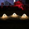 imageJOYIN Halloween Outdoor Decorations White Ghost Garden Stakes with Light Up Design 3 Packs Cloth Ghost for Halloween Lights Graveyard Yard Lawn Decorations