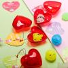 imageJOYIN 28 Packs Party Favor Set with 28 Glow In The Dark Mochi Squishy Toy Filled Hearts and Heart Cards Kawaii Stress Relief Toys for Kids Celebration and Classroom Exchange