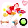 imageJOYIN 28 Packs Party Favor Set with 28 Glow In The Dark Mochi Squishy Toy Filled Hearts and Heart Cards Kawaii Stress Relief Toys for Kids Celebration and Classroom Exchange