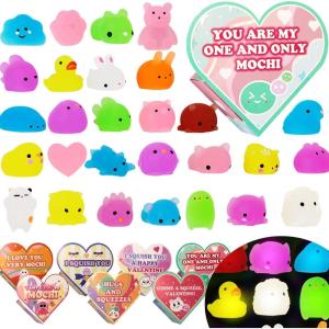 imageJOYIN 28 Packs Glow in The Dark Mochi squishy toy Party Favors with Heart Boxes for Kids Kawaii Classroom Exchange Party Gifts Stress Relief Toys Classroom Prize