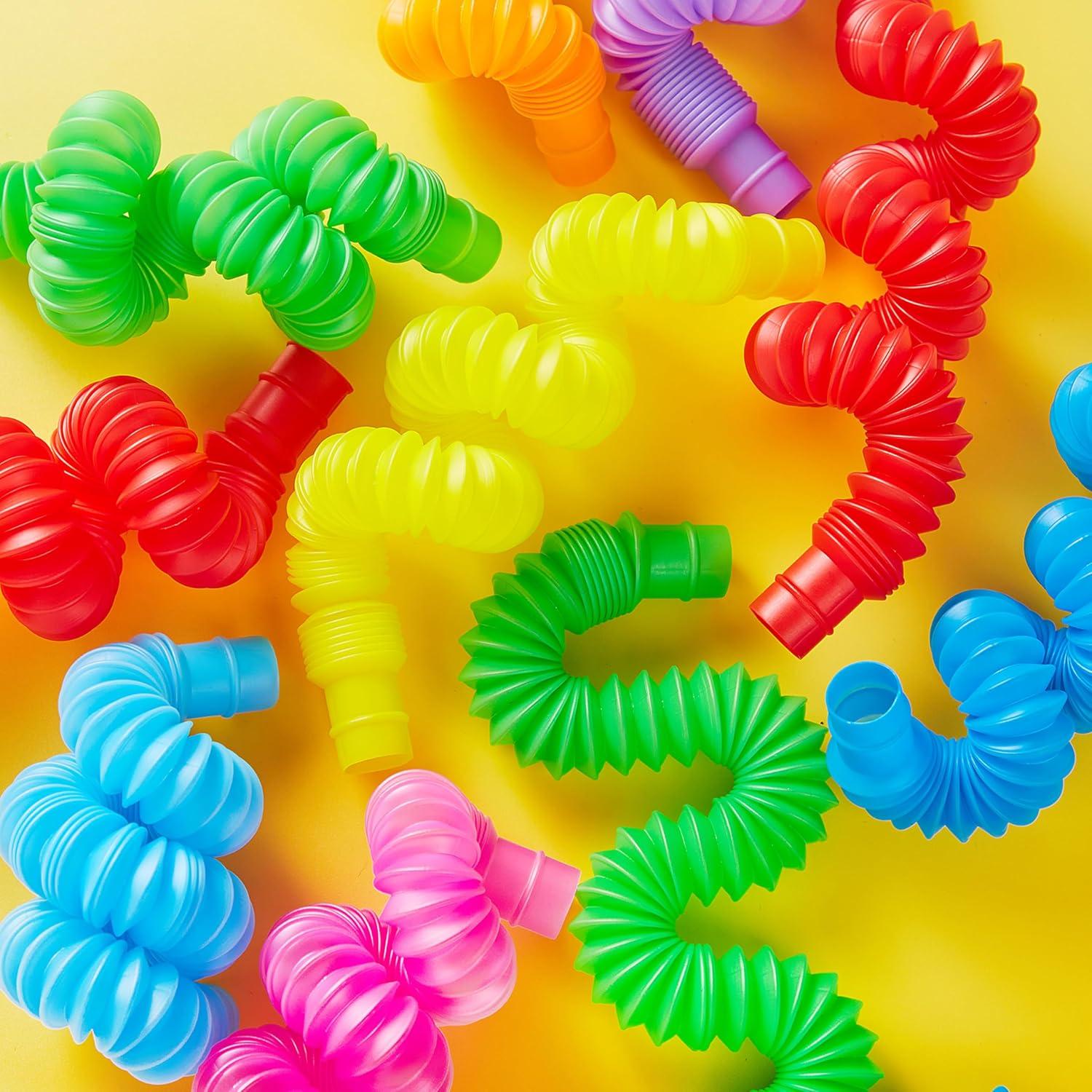 imageJOYIN 18 Pack Pop Tubes Sensory Toys Large Fidget Toys Party Favors  9 Colors Creativity Learning ampamp Fun for Toddler Kids  Perfect for Party Goodie Bags Stuffers Classroom School RewardSmall