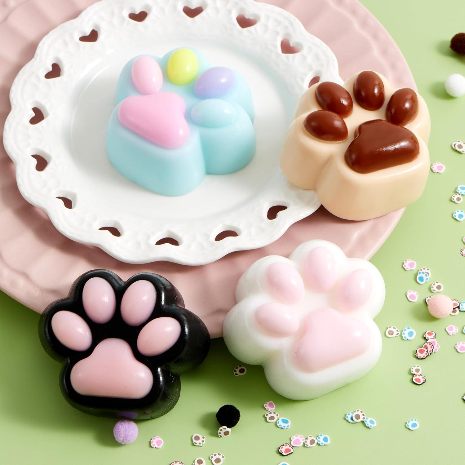imageJOYIN 4 Pcs Taba Paw Squeeze Toys Colorful Kawaii Mochi Fufu Sensory Toys Cat Paw Taba Squeeze Toys for Party Favors Gifts for Adults Kids