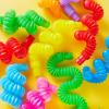 imageJOYIN 18 Pack Pop Tubes Sensory Toys Large Fidget Toys Party Favors  9 Colors Creativity Learning ampamp Fun for Toddler Kids  Perfect for Party Goodie Bags Stuffers Classroom School RewardSmall