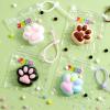 imageJOYIN 4 Pcs Taba Paw Squeeze Toys Colorful Kawaii Mochi Fufu Sensory Toys Cat Paw Taba Squeeze Toys for Party Favors Gifts for Adults Kids