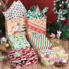 imageJOYIN Holiday Tissue Paper Assortment Ten Colors 150Piece Set Christmas Design Solid Holiday Holographic and Printed Gift Tissue Paper Assortment 20quot x 20quot inches