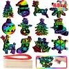 imageJOYIN 48 Pcs Christmas Scratch Art Ornaments Scratch Paper Craft Kit Include Snowman Snowflakes Christmas Tree and Reindeer Rainbow Color Scratch Off Hanging Ornament for Kids Party Favors