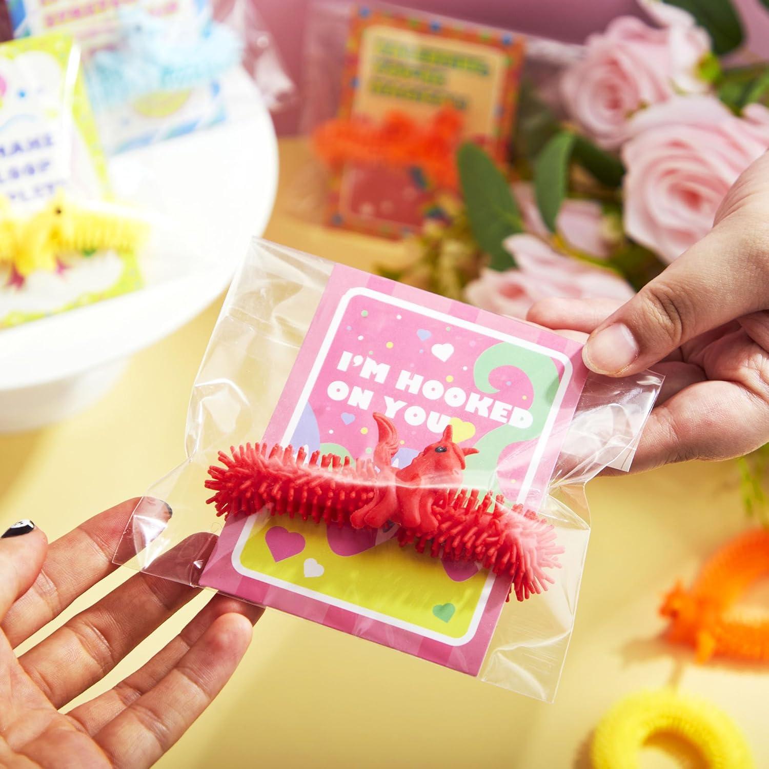 imageJOYIN 30 Pack Valentines Day Gift Cards with Multicolor Stretchy String Toys Set Unicorn Noodle Toys Stress Relief Fidget Toys for Kids Valentine Party Favors Classroom Gift Exchange Game Prize