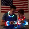 image:imageJOYIN 12 PCS 4th of July Red White Blue Glow Sticks amp Light Up Pop Tubes Patriotic Glow Toys Light up Bracelet Necklace Independence Day Party Favors Supplies for Parade Camp Games amp Activities
