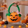 image:imageJOYIN Plush Halloween Pumpkin Basket 11 X 134 in Candy Trick or Treat Bag Cute Orange Tote Bucket with Handle for Kids Girls Boys Party Favor Supplies Trick or Treating Gifts BagCute Smiling Face